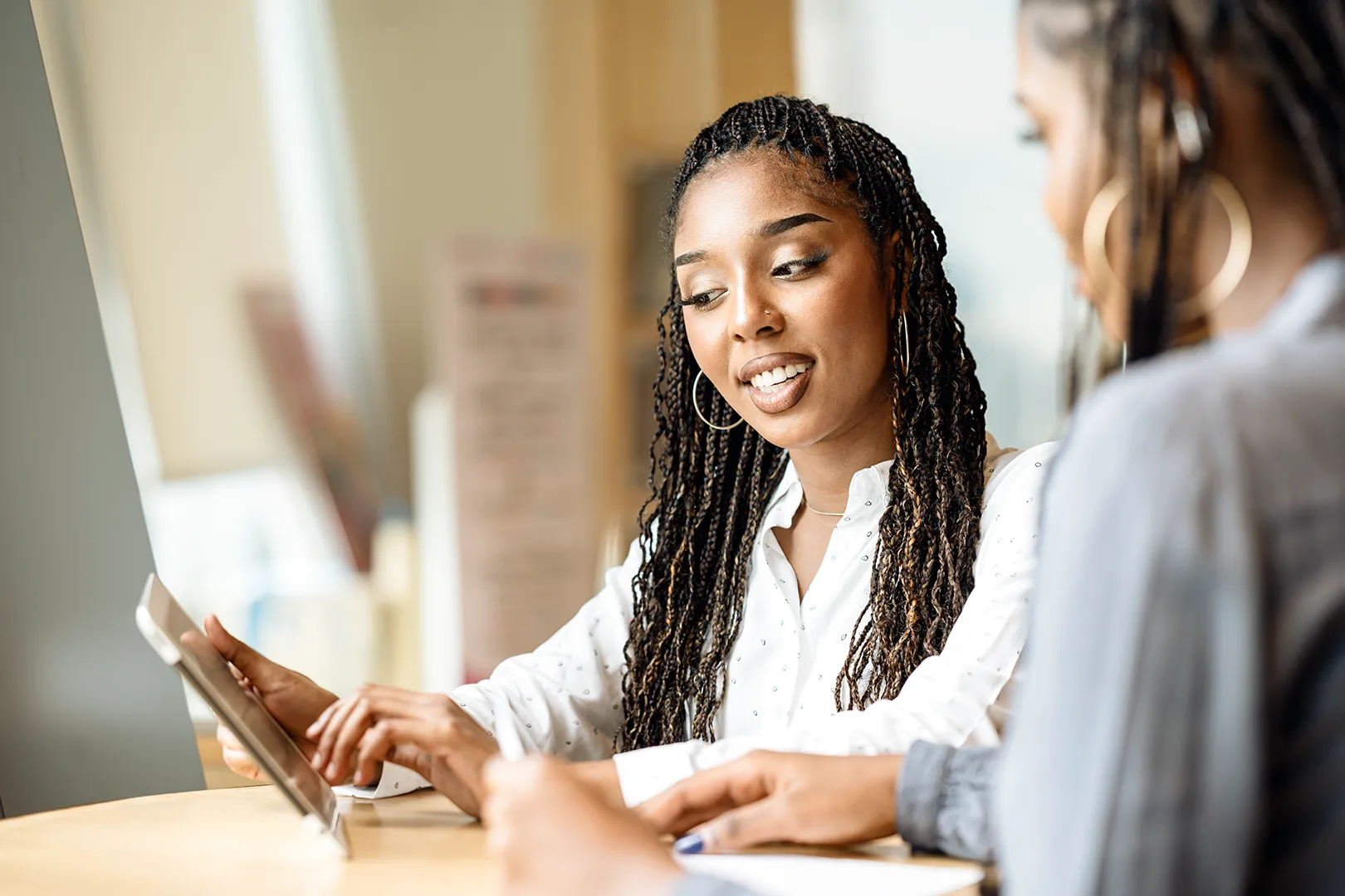 businesswoman helping a client