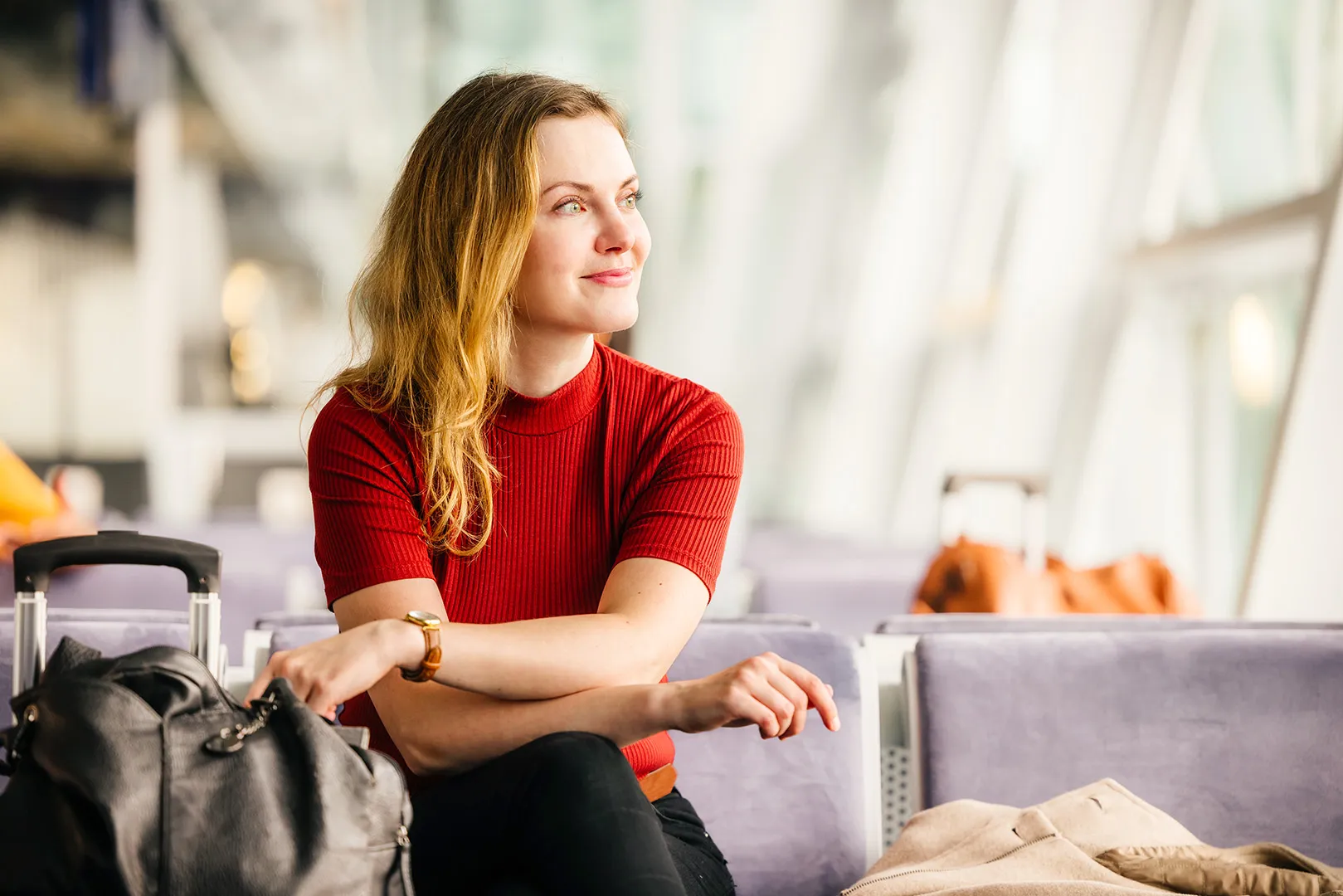 woman waiting in an airport