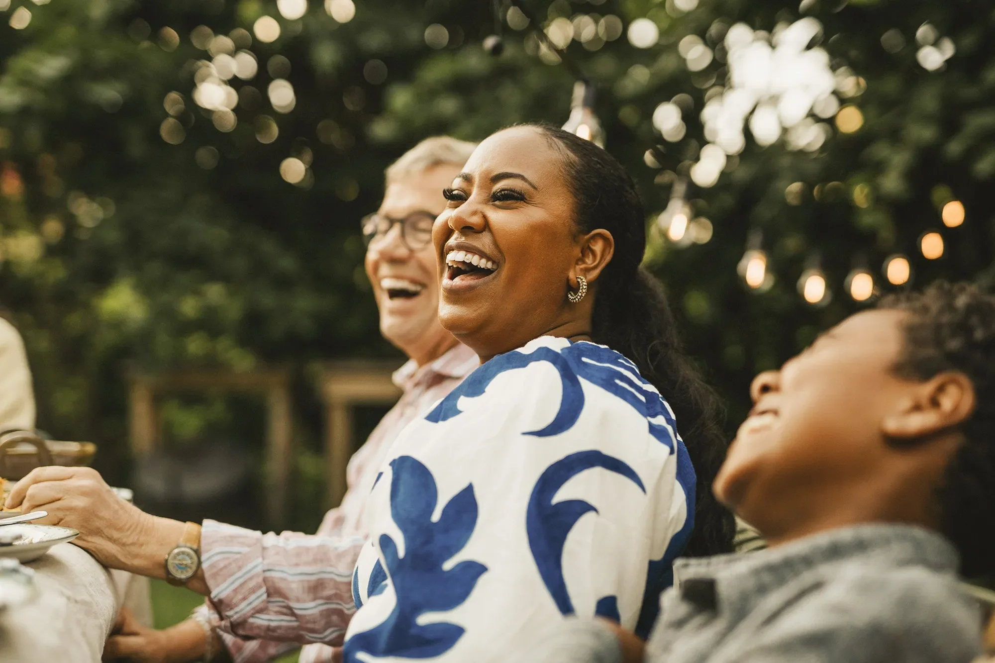 woman laughing outdoors